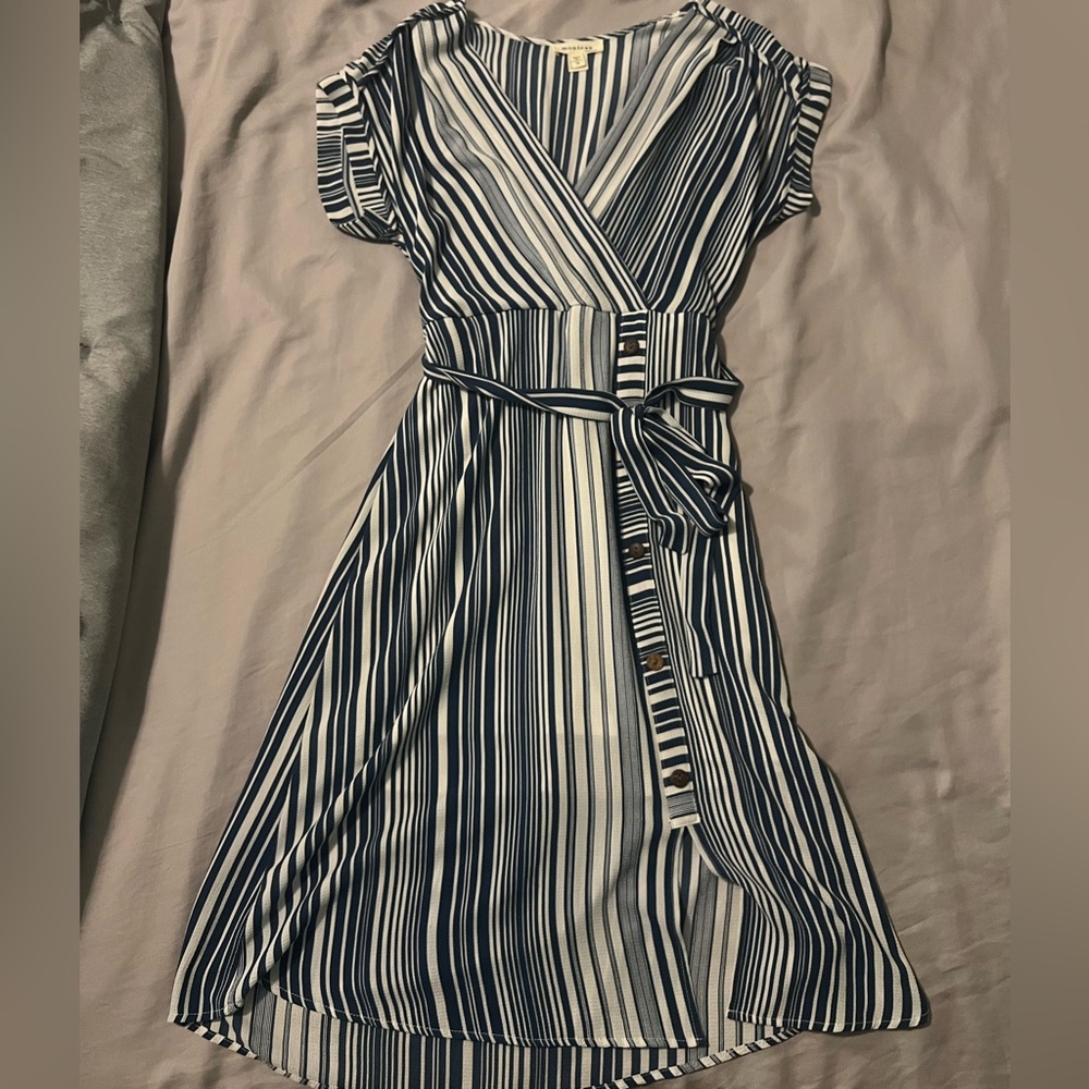 Navy and white dress. Goes to the knees
